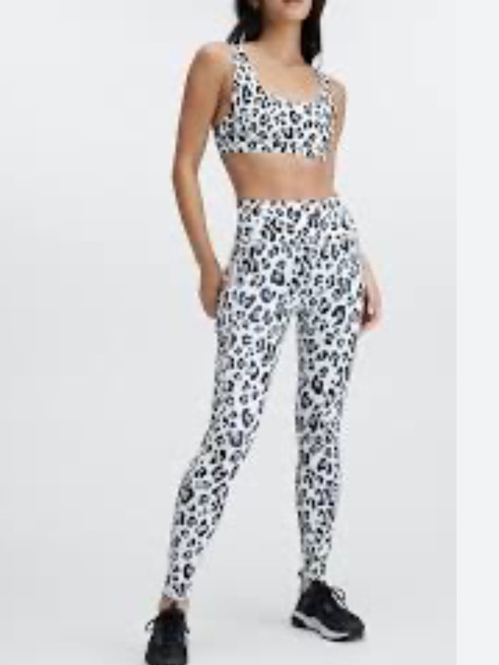 Fabletics two-piece matching activewear set featuring a bold black and white NWT